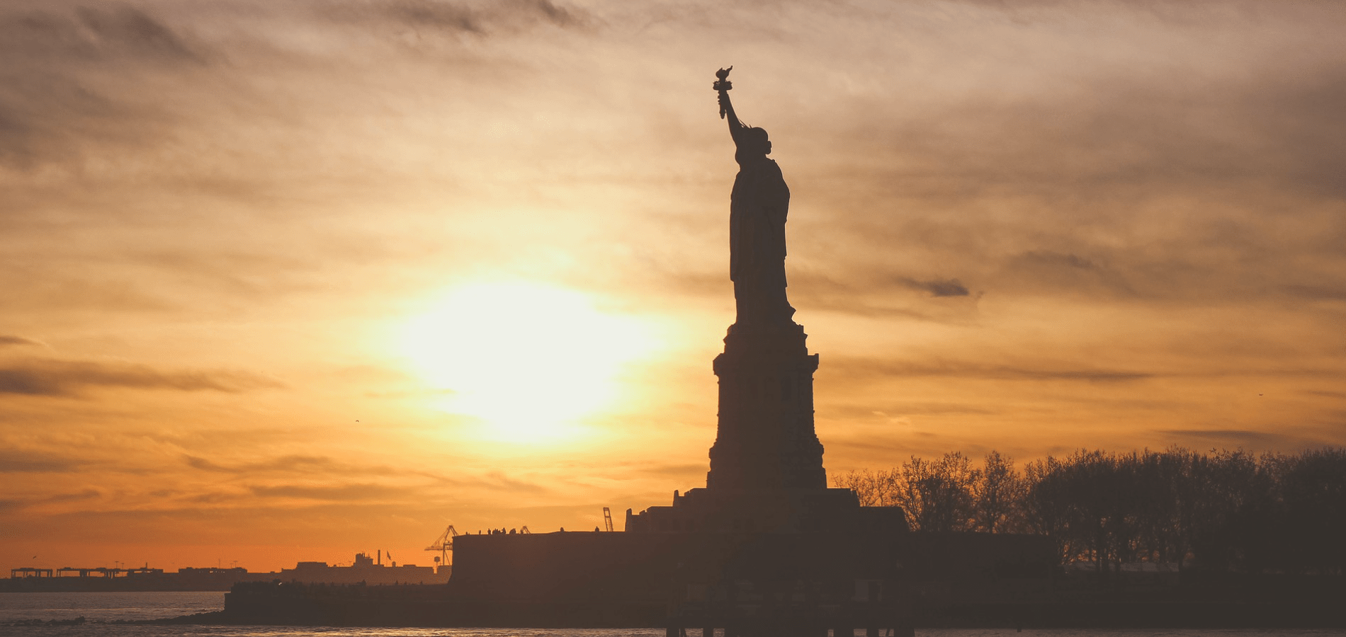 Statute of Liberty in sunset