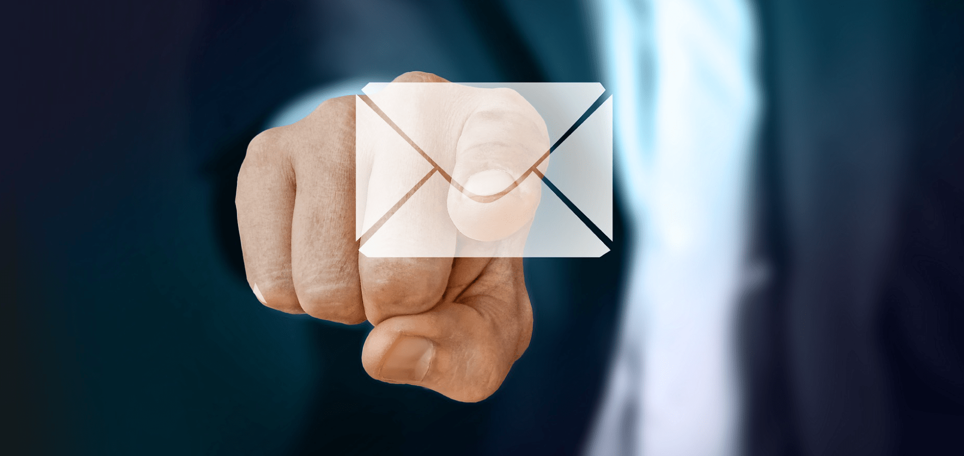 Business man pressing email icon