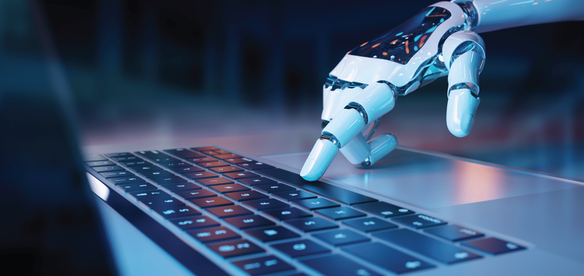 Robot hand typing laptop
