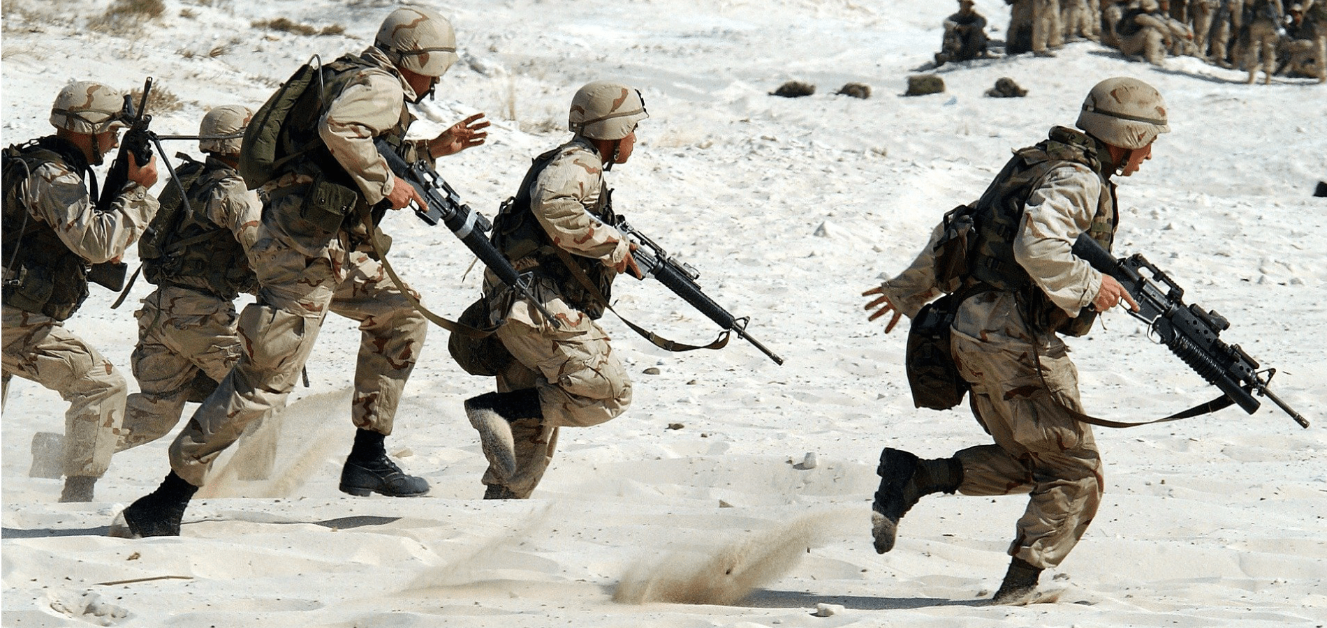 Soldiers running in the sand