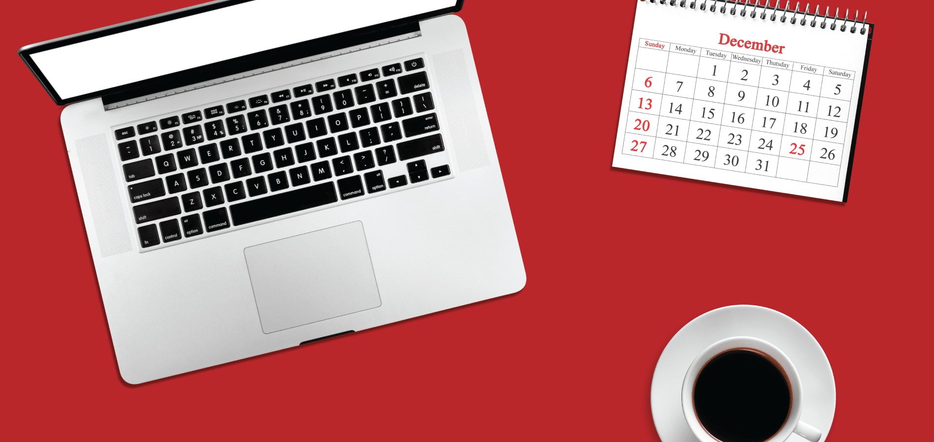 Computer, calendar, and coffee on red background