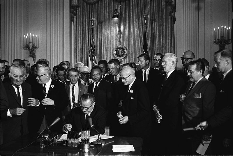 photo of Lyndon B. Johnson signing Civil Rights Act of 1964