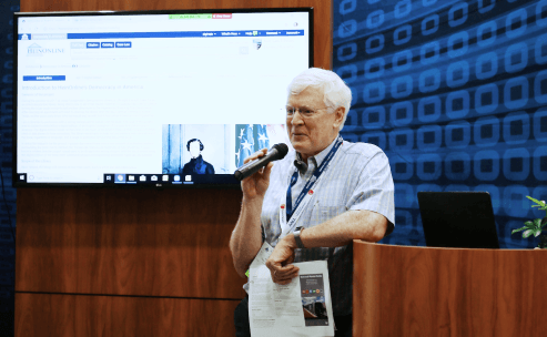 image of Alan Keely at AALL 2019 speaking at HeinOnline's booth