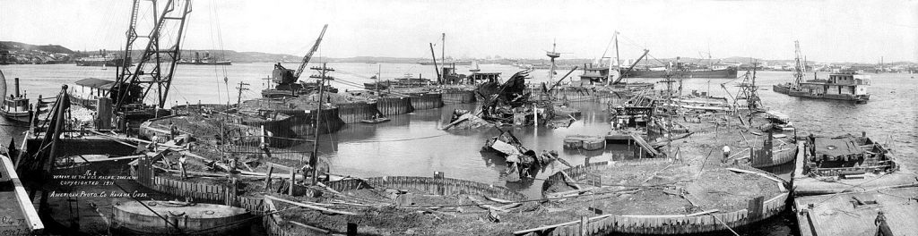 photo of the wreckage of the U.S.S. Maine surrounded by a cofferdam