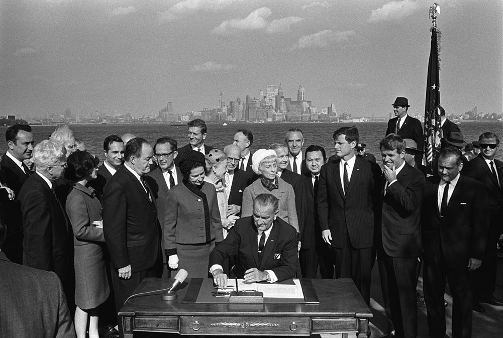 photo of President Lyndon B. Johnson signing Immigration Act of 1965 into law