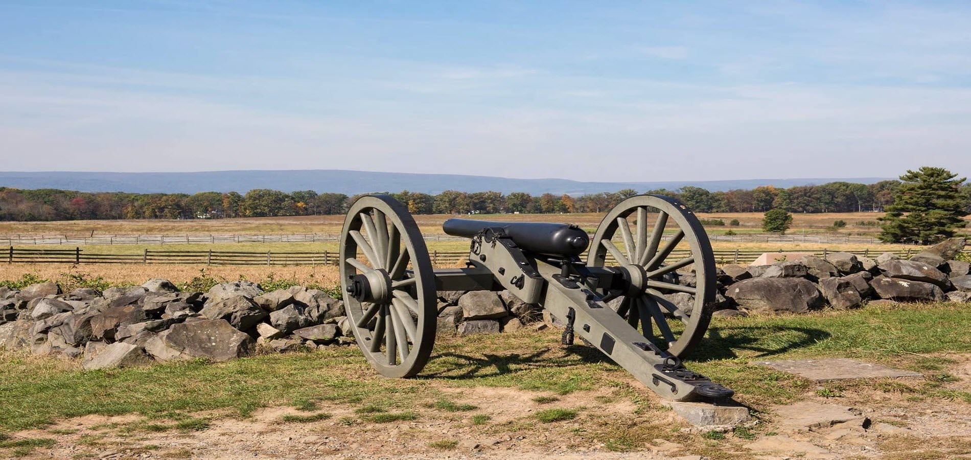 Civil War canon on open field.