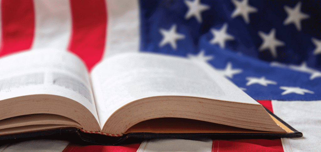 image of the American flag with an open book