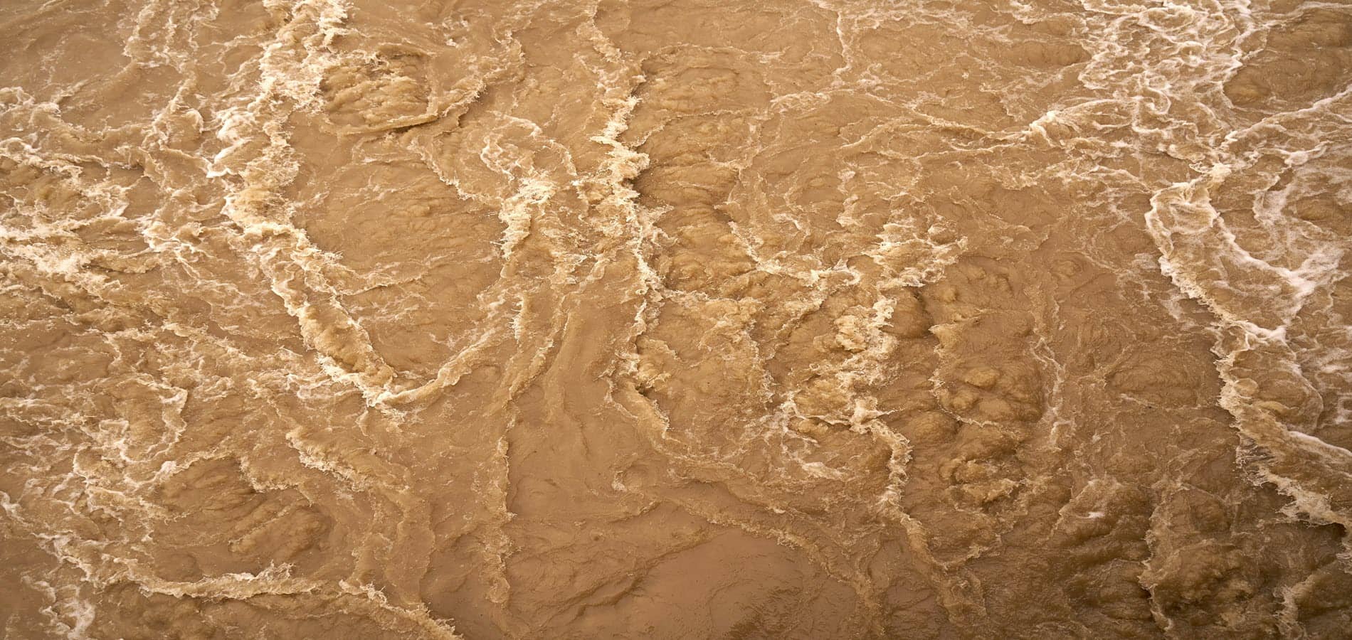 Swirling brown water