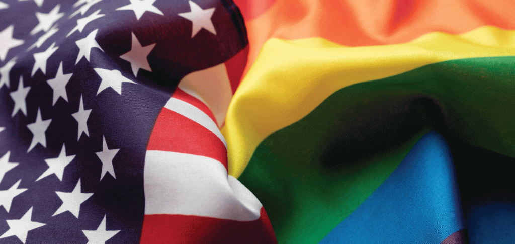 image of U.S. flag and rainbow flag next to each other